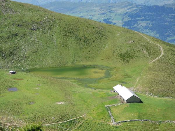 Sestup z Piz Danis a maskované jezírko
