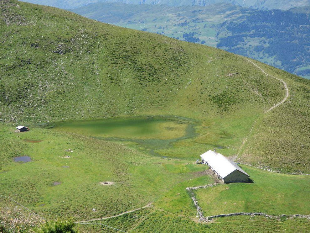 Sestup z Piz Danis a maskované jezírko